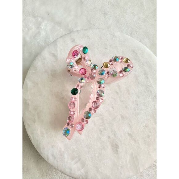 Pink rhinestone bow style hair claw - Picture 2 of 3